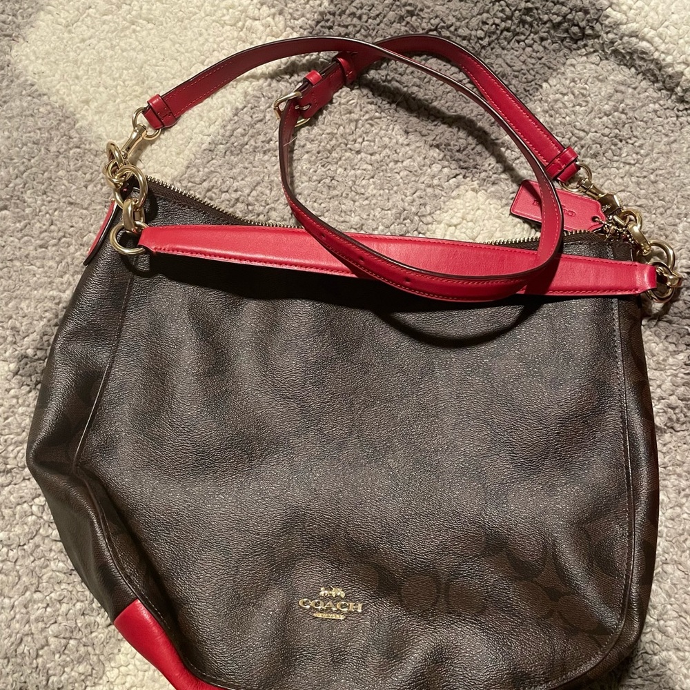 Red and brown Coach crossbody